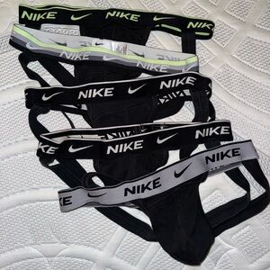 5 pair of Nike jock straps